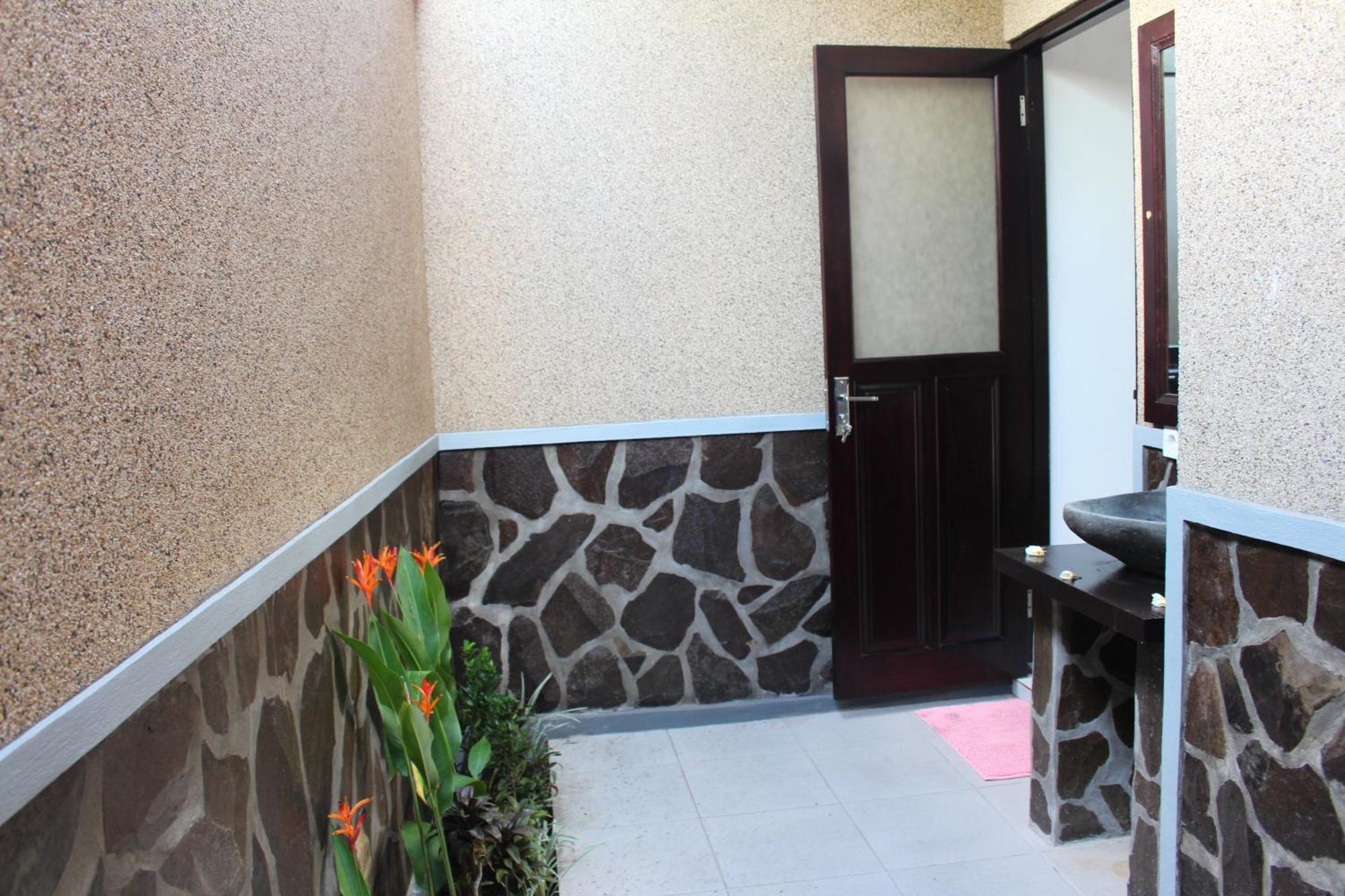 Magus Homestay Pemuteran Habitación foto