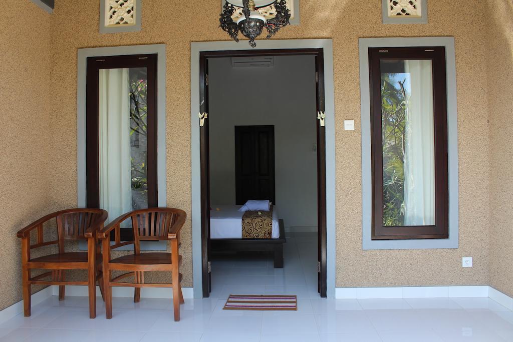 Magus Homestay Pemuteran Habitación foto