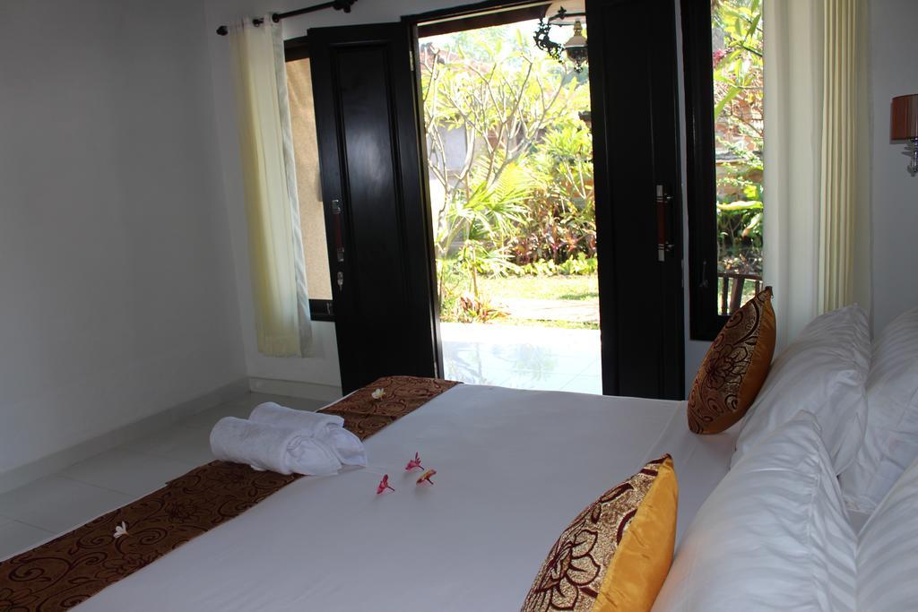 Magus Homestay Pemuteran Habitación foto